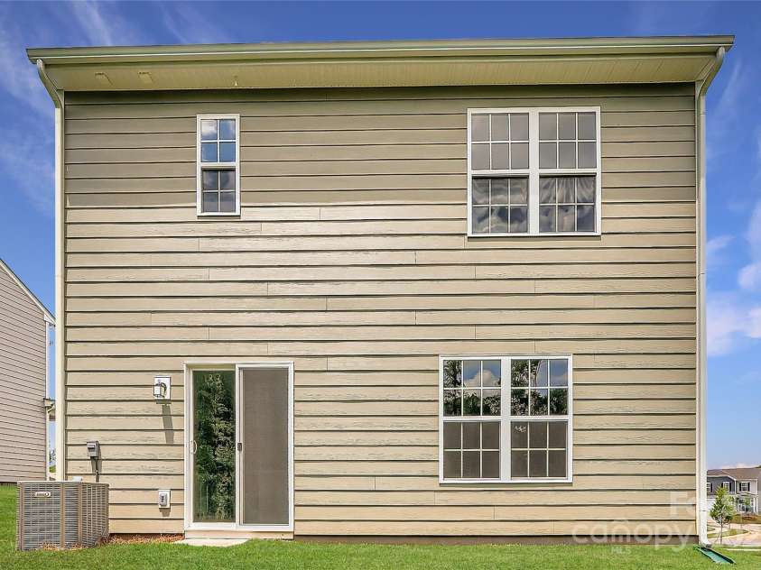 136 Dorian Place, Troutman, NC 28166.  MLS# CAR4272157, YatesRealty ID 23389. Backyard