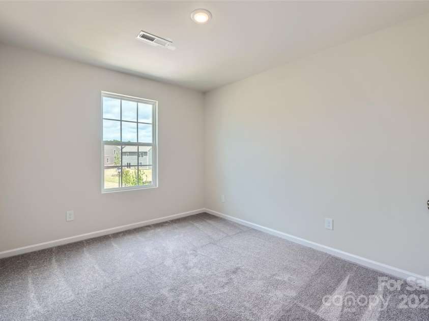 136 Dorian Place, Troutman, NC 28166.  MLS# CAR4272157, YatesRealty ID 23389. Bedroom