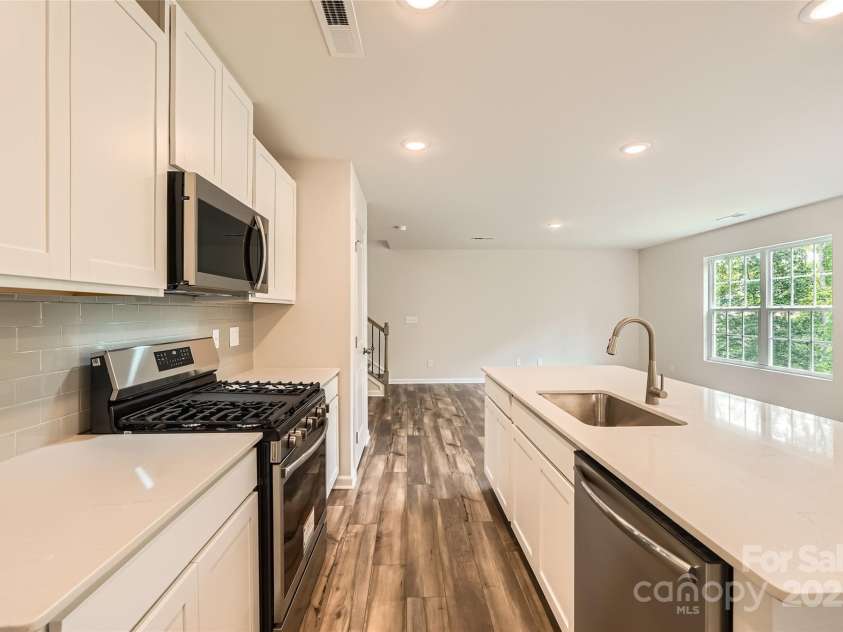 136 Dorian Place, Troutman, NC 28166.  MLS# CAR4272157, YatesRealty ID 23389. Kitchen