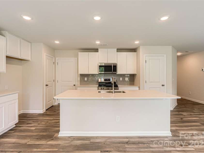 136 Dorian Place, Troutman, NC 28166.  MLS# CAR4272157, YatesRealty ID 23389. Kitchen