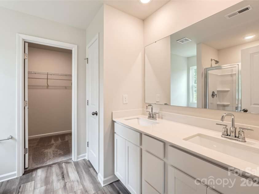 136 Dorian Place, Troutman, NC 28166.  MLS# CAR4272157, YatesRealty ID 23389. Primary Bathroom