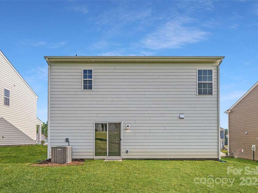 144 Astor Street, Troutman, NC 28166.  MLS# CAR4272164, YatesRealty ID 23390. Backyard