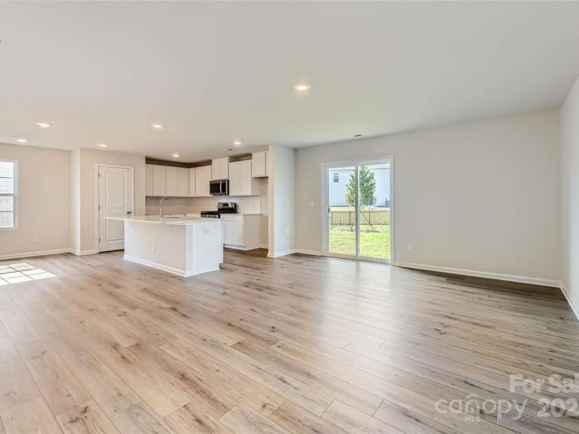 144 Astor Street, Troutman, NC 28166.  MLS# CAR4272164, YatesRealty ID 23390. Family Room