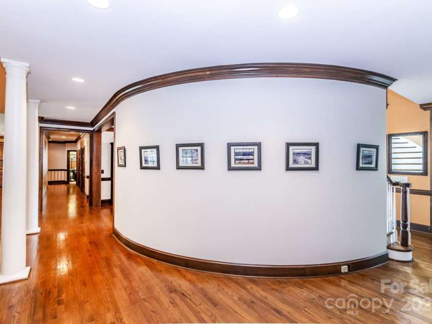 1720 Mills Harris Road, Wingate, NC 28174.  MLS# CAR4254927, YatesRealty ID 23395. Downstairs hallway