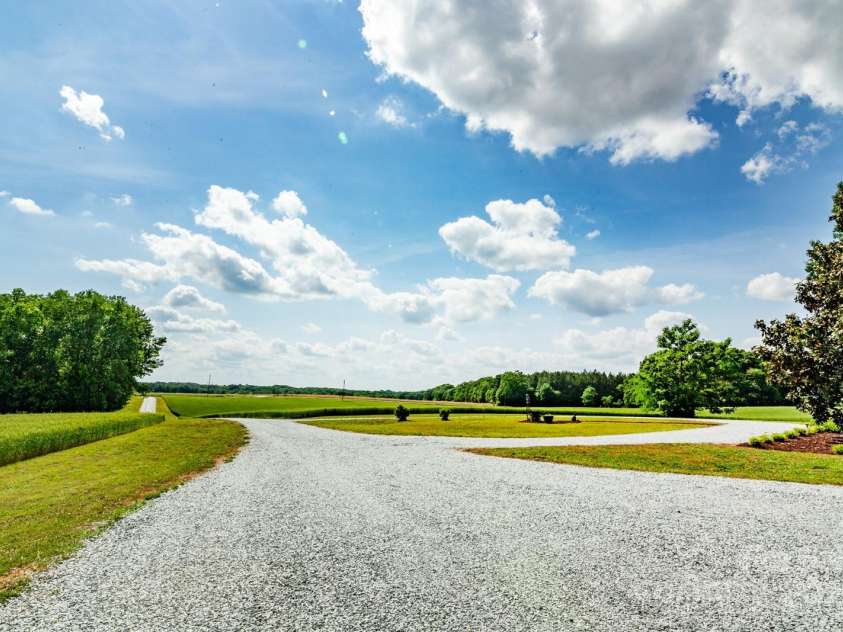 1720 Mills Harris Road, Wingate, NC 28174.  MLS# CAR4254927, YatesRealty ID 23395. Driveway to Property