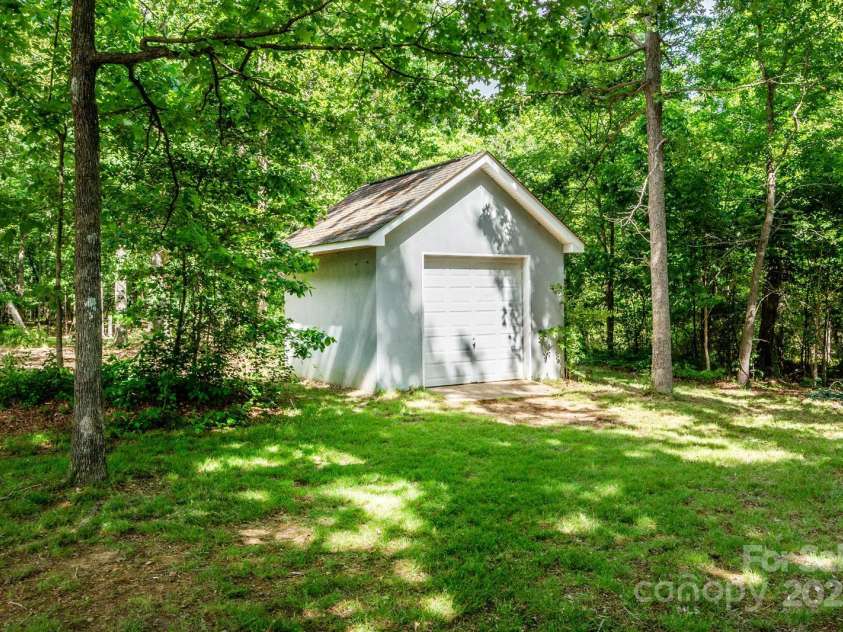 1720 Mills Harris Road, Wingate, NC 28174.  MLS# CAR4254927, YatesRealty ID 23395. Storage Buildling