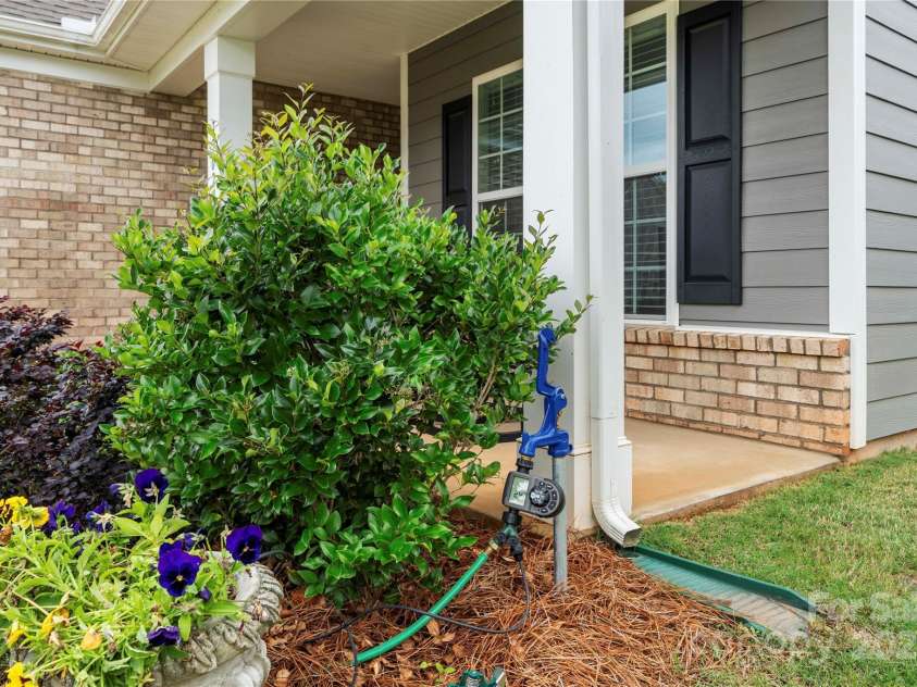 17028 River Race Drive, Huntersville, NC 28078.  MLS# CAR4259977, YatesRealty ID 23397. Frost-proof yard hydrant for garden enthusiasts