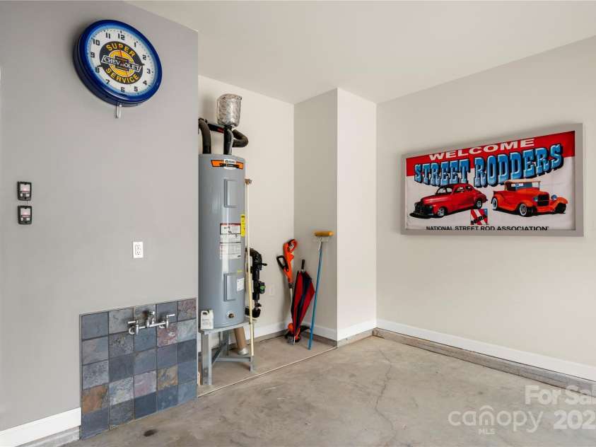 17028 River Race Drive, Huntersville, NC 28078.  MLS# CAR4259977, YatesRealty ID 23397. Garage features a hot and cold hose bib for washing your classic car or bathing your pets