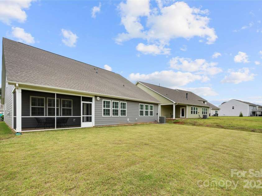17028 River Race Drive, Huntersville, NC 28078.  MLS# CAR4259977, YatesRealty ID 23397. Level backyard is a blank slate
