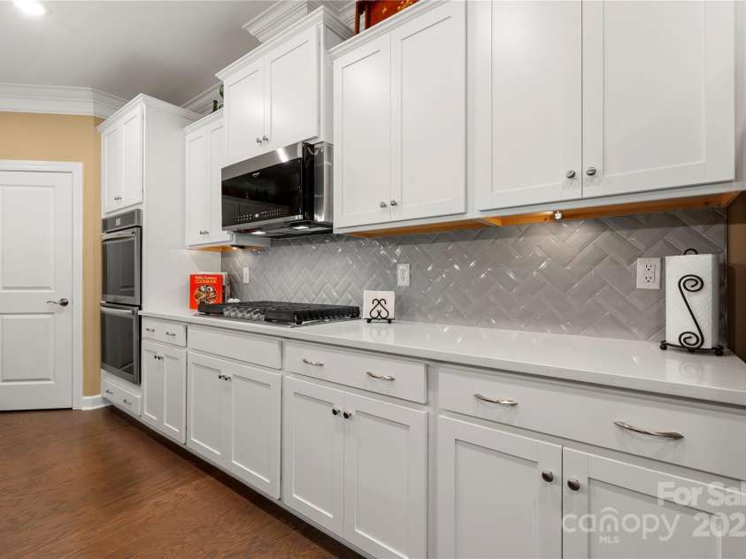 17028 River Race Drive, Huntersville, NC 28078.  MLS# CAR4259977, YatesRealty ID 23397. Plenty of cabinetry and corian countertops