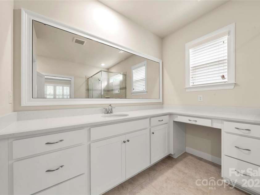 17028 River Race Drive, Huntersville, NC 28078.  MLS# CAR4259977, YatesRealty ID 23397. Plenty of cabinets and corian countertops