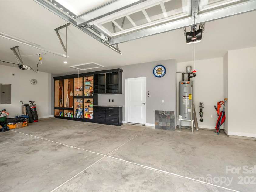 17028 River Race Drive, Huntersville, NC 28078.  MLS# CAR4259977, YatesRealty ID 23397. Three car garage with myQ smart garage door system