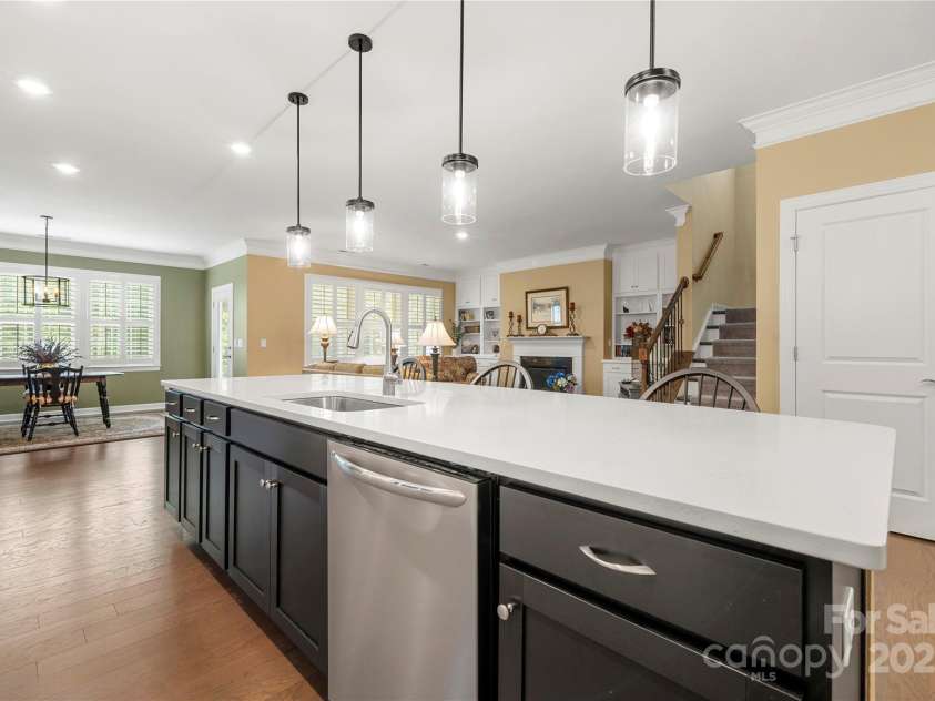 17028 River Race Drive, Huntersville, NC 28078.  MLS# CAR4259977, YatesRealty ID 23397. View from island into living room