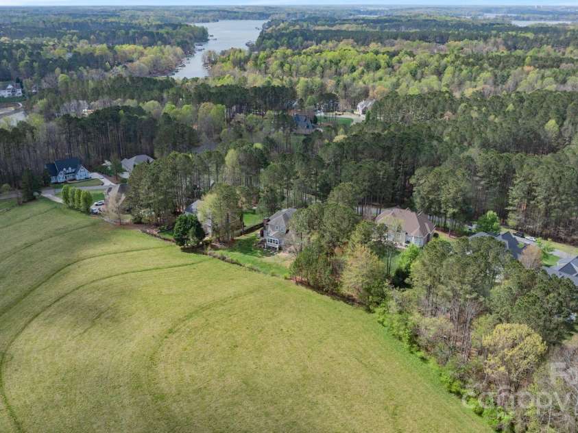 116 Whispering Cove Court, Mooresville, NC 28117.  MLS# CAR4242039, YatesRealty ID 23399. 8 Min Drive to Stumpy Creek Boat Launch