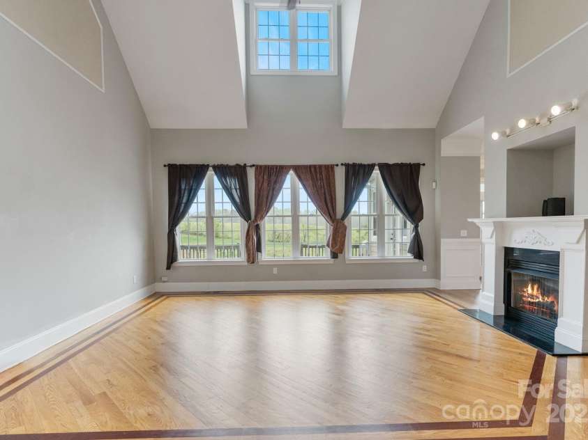 116 Whispering Cove Court, Mooresville, NC 28117.  MLS# CAR4242039, YatesRealty ID 23399. Cozy Gas Log Fireplaces