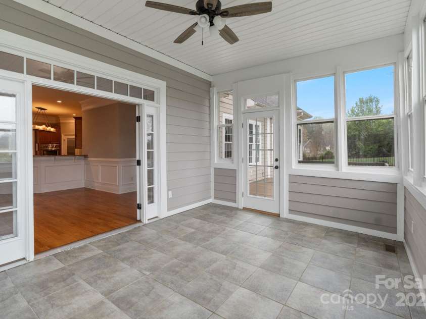 116 Whispering Cove Court, Mooresville, NC 28117.  MLS# CAR4242039, YatesRealty ID 23399. Heated Sunroom