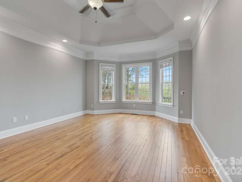 116 Whispering Cove Court, Mooresville, NC 28117.  MLS# CAR4242039, YatesRealty ID 23399. Primary Bedroom
