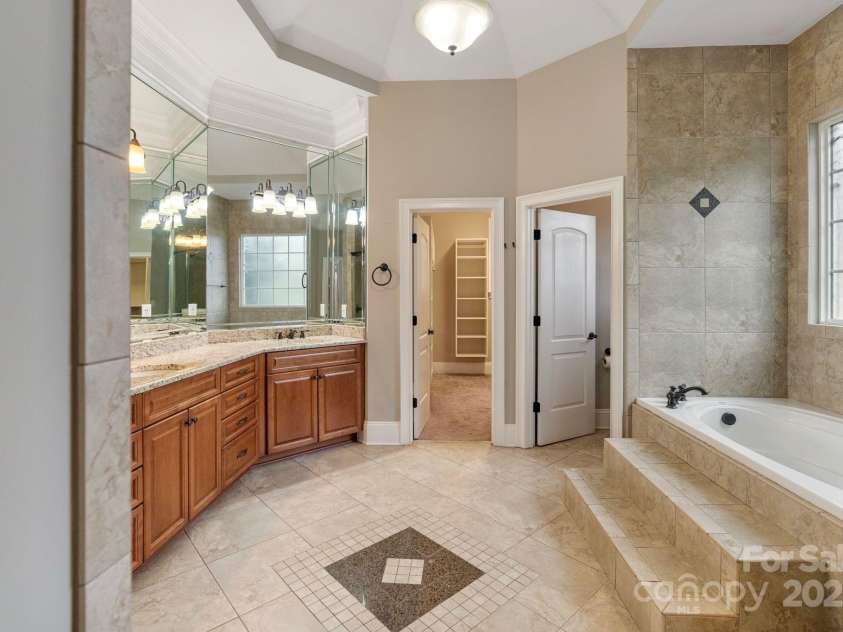 116 Whispering Cove Court, Mooresville, NC 28117.  MLS# CAR4242039, YatesRealty ID 23399. Spa-Like Primary Bath