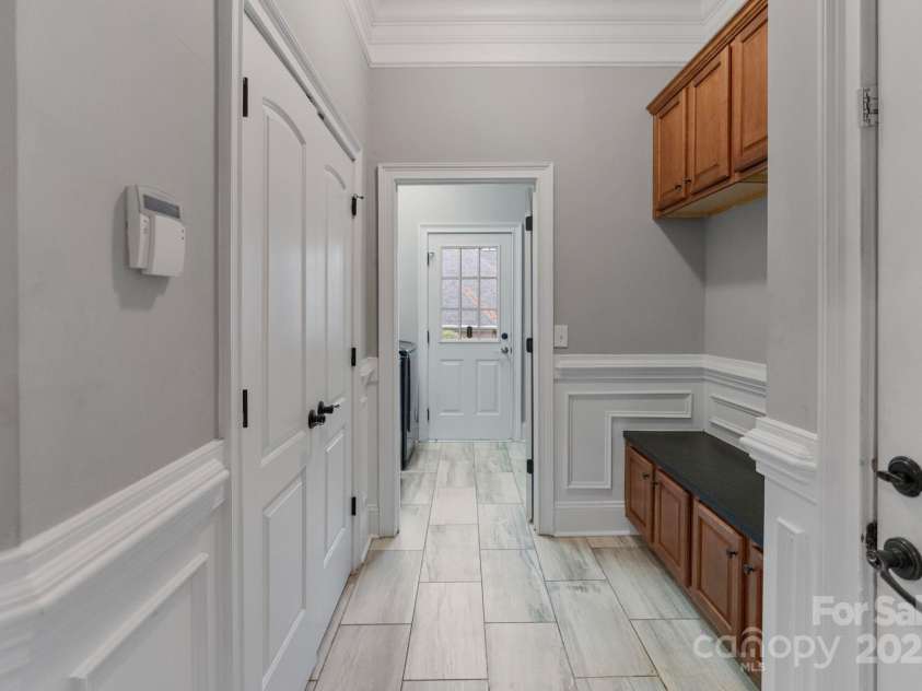 116 Whispering Cove Court, Mooresville, NC 28117.  MLS# CAR4242039, YatesRealty ID 23399. Spacious Laundry & Mudroom on Main Level