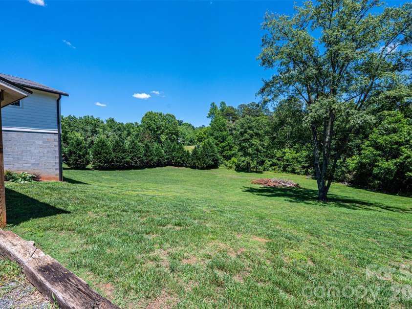 460 Sunset Street, Granite Falls, NC 28630.  MLS# CAR4382818, YatesRealty ID 23399. Back/side yard
