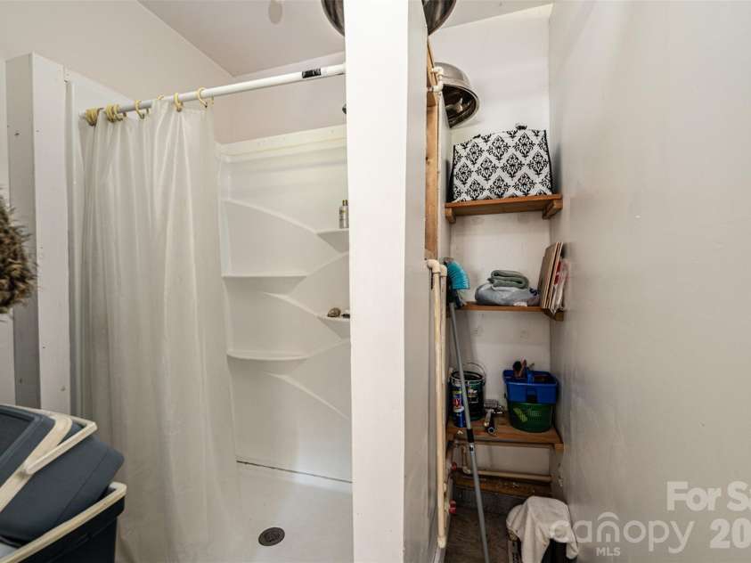 460 Sunset Street, Granite Falls, NC 28630.  MLS# CAR4382818, YatesRealty ID 23399. Garage shower