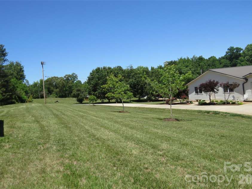 460 Sunset Street, Granite Falls, NC 28630.  MLS# CAR4382818, YatesRealty ID 23399. Side yard 
