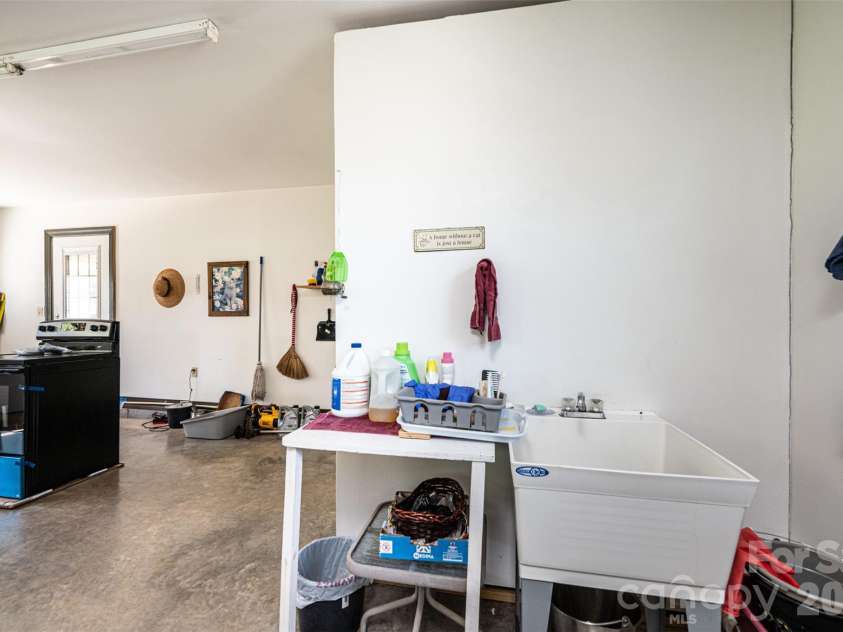 460 Sunset Street, Granite Falls, NC 28630.  MLS# CAR4382818, YatesRealty ID 23399. Sink in garage