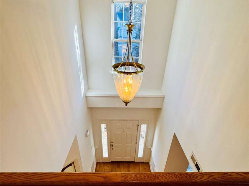 7411 Gate Key Court, Stanley, NC 28164.  MLS# CAR4335011, YatesRealty ID 2340. Another view from upstairs to main Door.