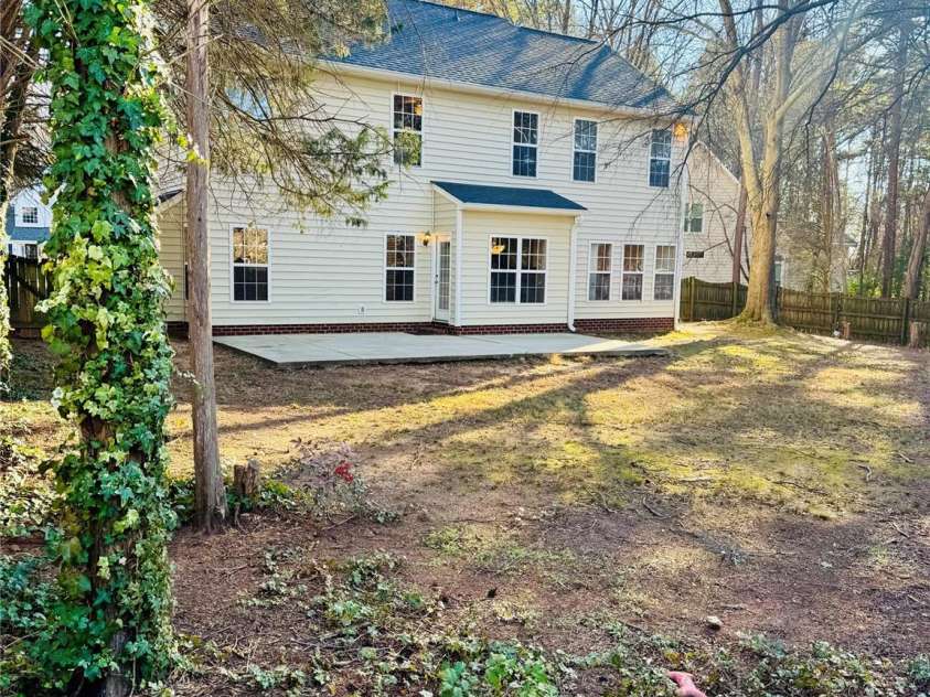 7411 Gate Key Court, Stanley, NC 28164.  MLS# CAR4335011, YatesRealty ID 2340. House view from the fenced Back Yard.