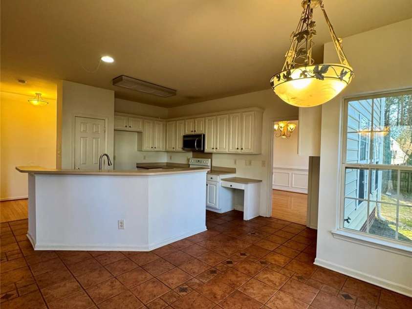 7411 Gate Key Court, Stanley, NC 28164.  MLS# CAR4335011, YatesRealty ID 2340. Kitchen view from Breakfast