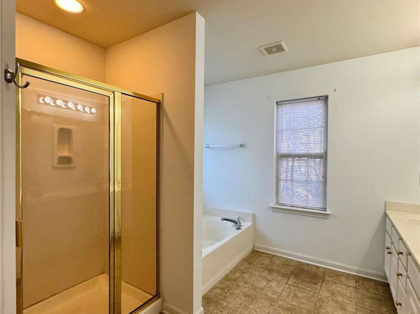 7411 Gate Key Court, Stanley, NC 28164.  MLS# CAR4335011, YatesRealty ID 2340. MB Bathroom with natural Light.