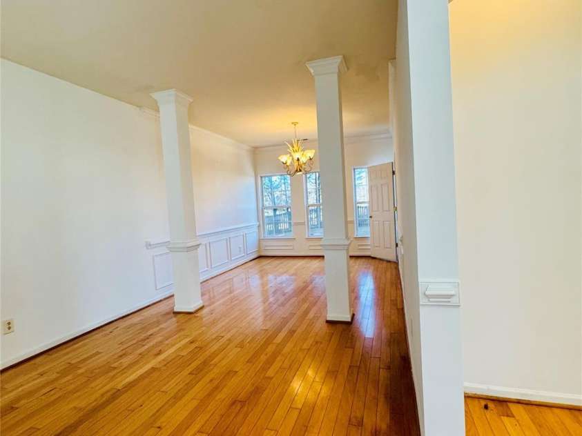 7411 Gate Key Court, Stanley, NC 28164.  MLS# CAR4335011, YatesRealty ID 2340. View from Foyer to Formal Living and Dining Room.