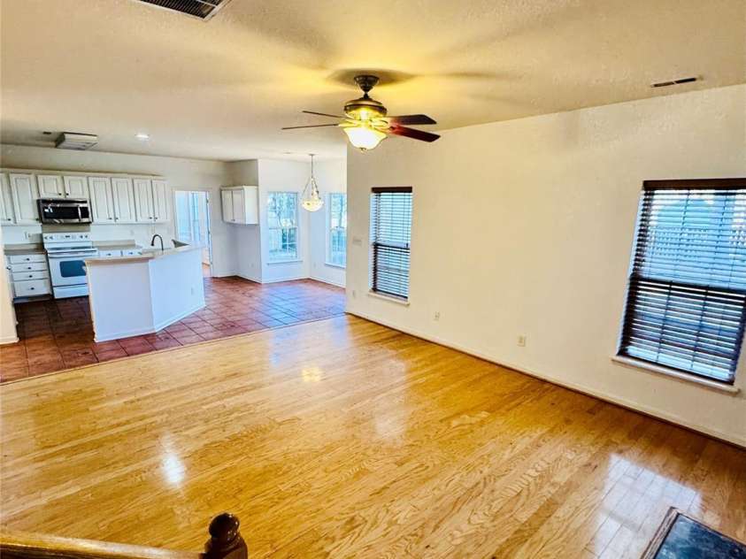 7411 Gate Key Court, Stanley, NC 28164.  MLS# CAR4335011, YatesRealty ID 2340. View from stairs to the Family Area.