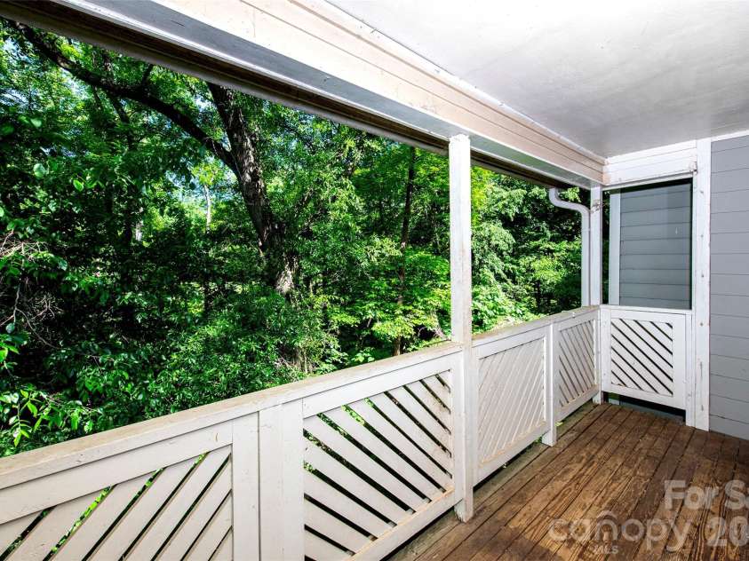 6500 Clavell Lane, Charlotte, NC 28210.  MLS# CAR4379511, YatesRealty ID 23401. Very Private  back balcony