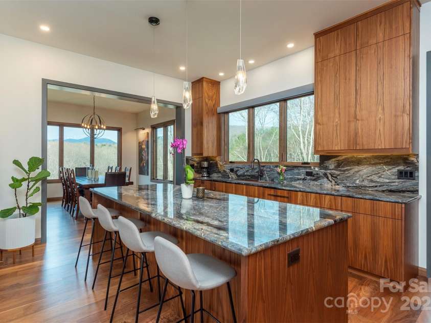 158 Riverbend Forest Drive, Asheville, NC 28805.  MLS# CAR4240684, YatesRealty ID 23402. Beautiful island with seating for 4 people