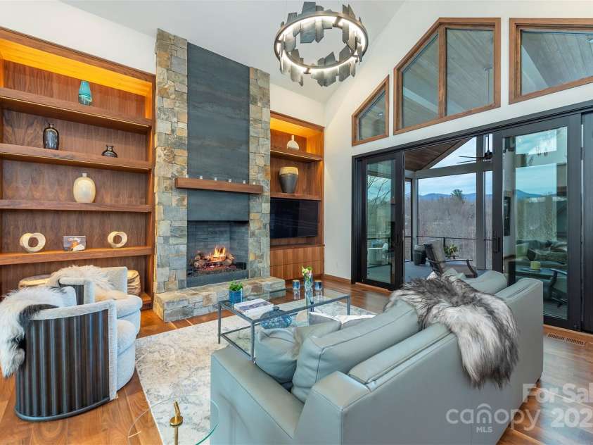 158 Riverbend Forest Drive, Asheville, NC 28805.  MLS# CAR4240684, YatesRealty ID 23402. Custom built ins and fireplace