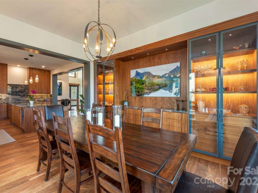 158 Riverbend Forest Drive, Asheville, NC 28805.  MLS# CAR4240684, YatesRealty ID 23402. Custom built-ins for the dining area