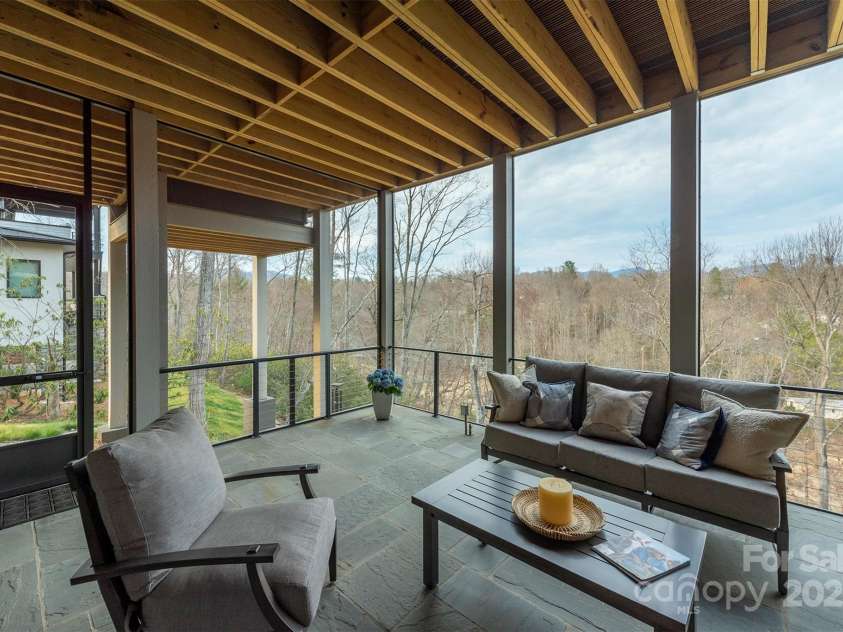 158 Riverbend Forest Drive, Asheville, NC 28805.  MLS# CAR4240684, YatesRealty ID 23402. Lower level deck