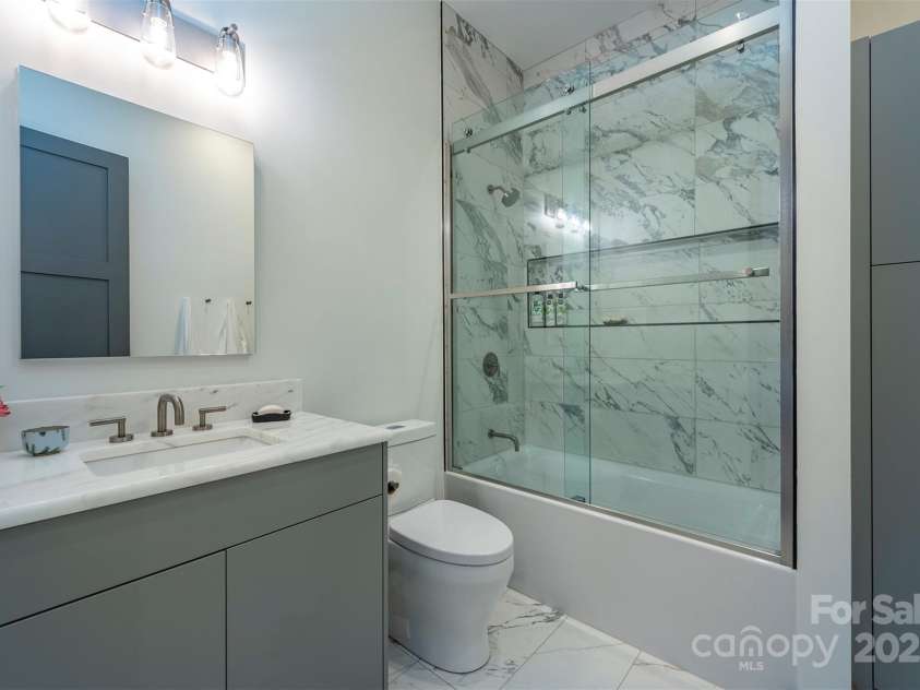 158 Riverbend Forest Drive, Asheville, NC 28805.  MLS# CAR4240684, YatesRealty ID 23402. Lower level full bathroom