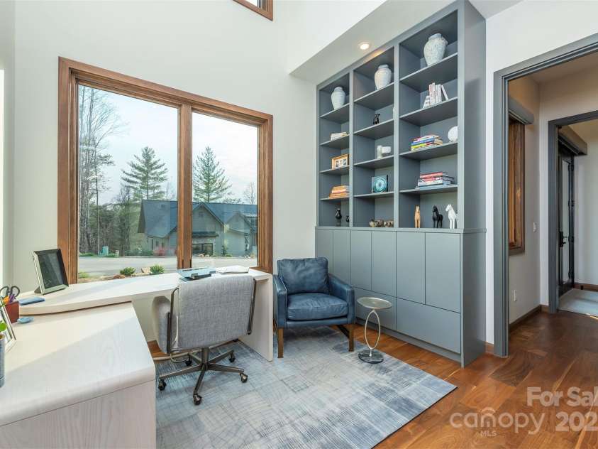 158 Riverbend Forest Drive, Asheville, NC 28805.  MLS# CAR4240684, YatesRealty ID 23402. Main level office with custom built-ins