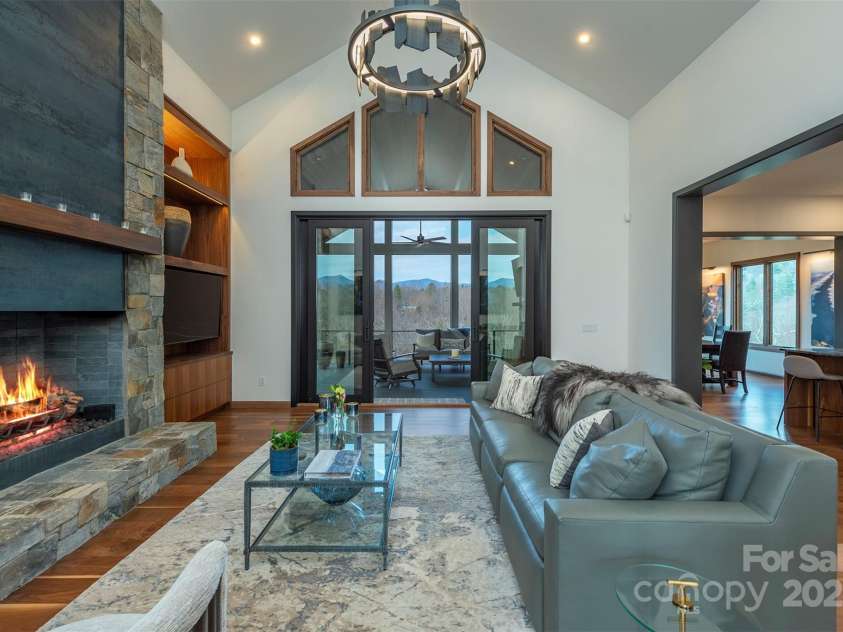 158 Riverbend Forest Drive, Asheville, NC 28805.  MLS# CAR4240684, YatesRealty ID 23402. Main living area with beautiful views and deck