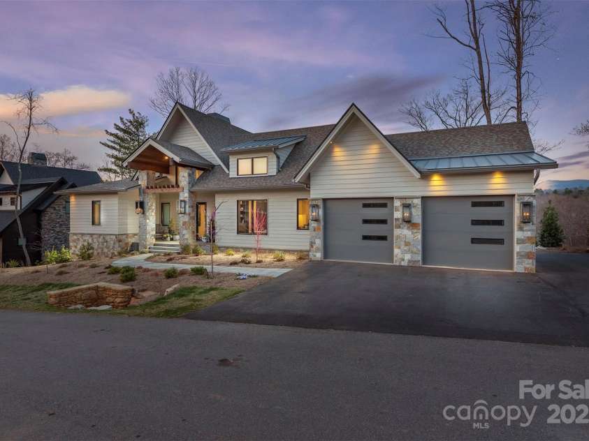 158 Riverbend Forest Drive, Asheville, NC 28805.  MLS# CAR4240684, YatesRealty ID 23402. Outside lanterns are propane