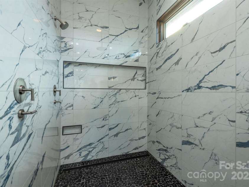 158 Riverbend Forest Drive, Asheville, NC 28805.  MLS# CAR4240684, YatesRealty ID 23402. Primary Shower