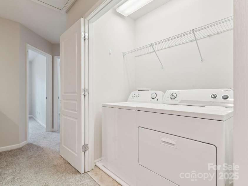 570 Sixth Baxter Crossing, Fort Mill, SC 29708.  MLS# CAR4275580, YatesRealty ID 23403. Laundry closet on upper floor.