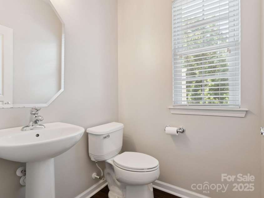 570 Sixth Baxter Crossing, Fort Mill, SC 29708.  MLS# CAR4275580, YatesRealty ID 23403. Powder room on main level
