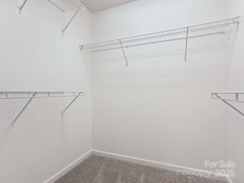 570 Sixth Baxter Crossing, Fort Mill, SC 29708.  MLS# CAR4275580, YatesRealty ID 23403. Primary walk-in closet