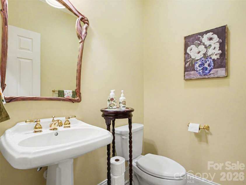 1422 Stone Gate Drive, Shelby, NC 28150.  MLS# CAR4358985, YatesRealty ID 23404. Half bath located near living areas