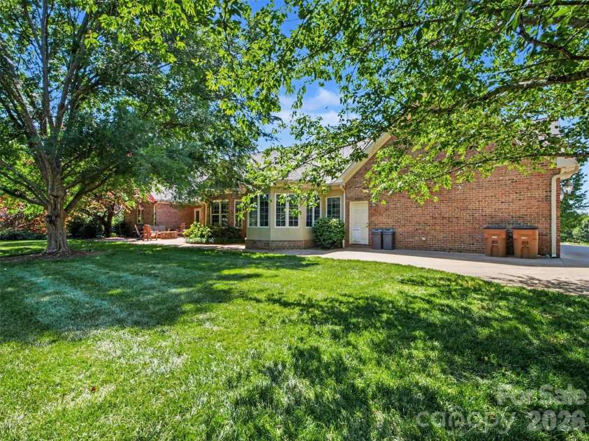 1422 Stone Gate Drive, Shelby, NC 28150.  MLS# CAR4358985, YatesRealty ID 23404. The garage has an exterior door to the back yard along with an Invisible Fence-controlled dog door!