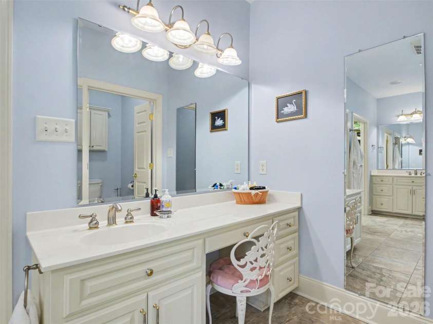 1422 Stone Gate Drive, Shelby, NC 28150.  MLS# CAR4358985, YatesRealty ID 23404. The primary bath also has two separate vanities...
