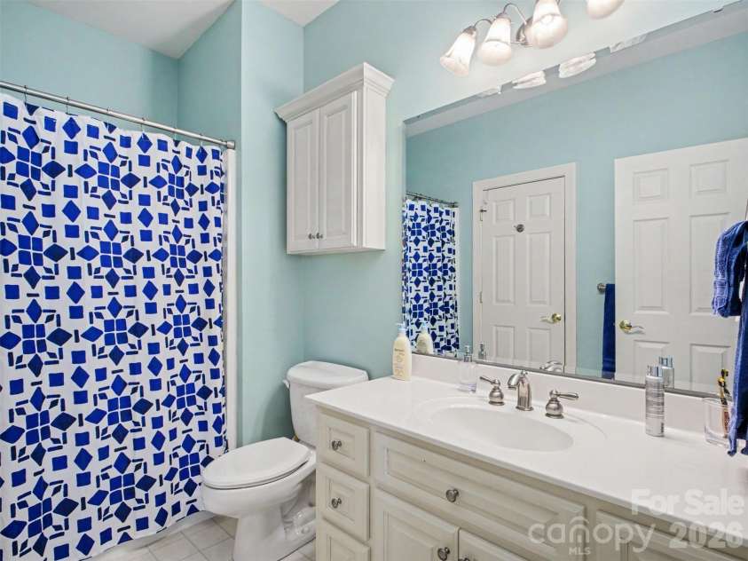 1422 Stone Gate Drive, Shelby, NC 28150.  MLS# CAR4358985, YatesRealty ID 23404. The second bedroom has an ensuite full bath